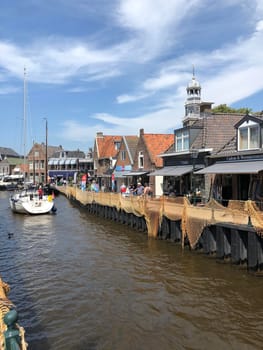 Sailboat in the canal of Lemmer, Friesland The Netherlands