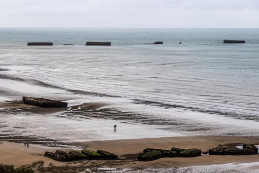 Arromanches, France 09.26.2019 WW2 D-Day Normandy Beaches museum site with statue, Gold Beach section attacked by British forces . High quality photo