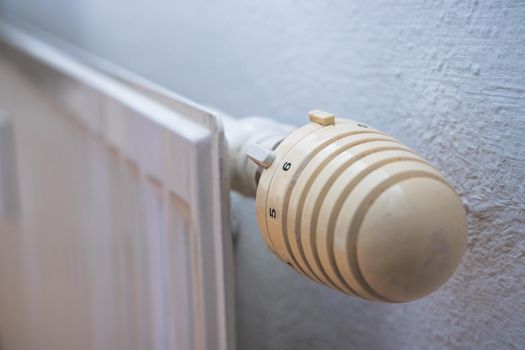 Close up picture of a heat regulator. Good indoor climate. On.