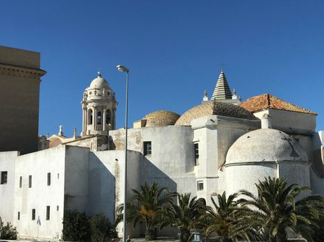 Cadiz cathedral and the Parroquia de Santa Cruz church in Cadiz Spain
