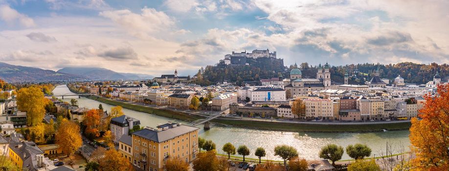 Panorama of Salzburg historic district at autumn time, colorful leaves and colors with sunshine, Austria