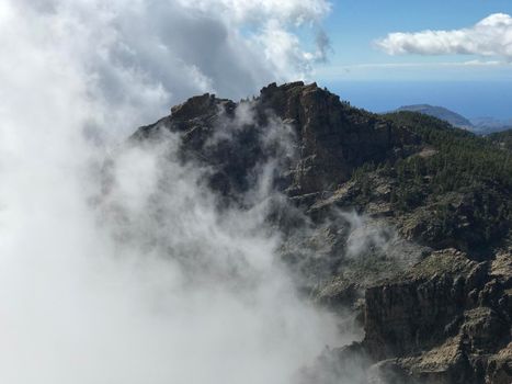 Couds rising up from the valley at Pico de las Nieves the highest peak of the island of Gran Canaria