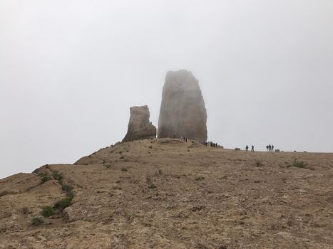 Roque Nublo a volcanic rock on the island of Gran Canaria in the mist