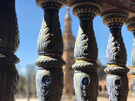 Painted pillars at Plaza de Espana in Seville Spain