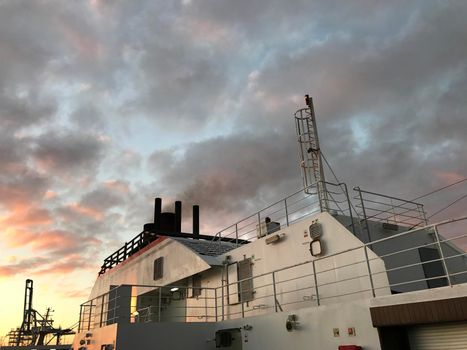 Sunrise above the ferry in the harbour of Las Palmas Gran Canaria