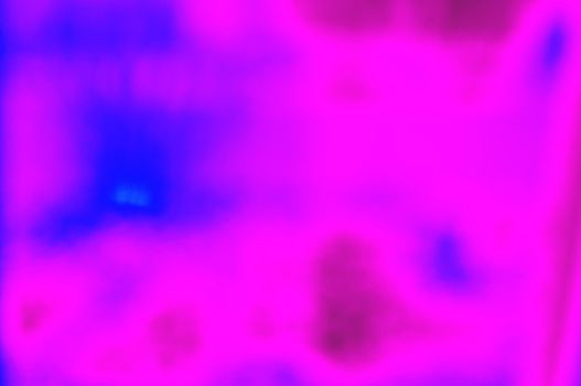 abstract background of bright pink and blue colors arranged chaotically in the form of spots