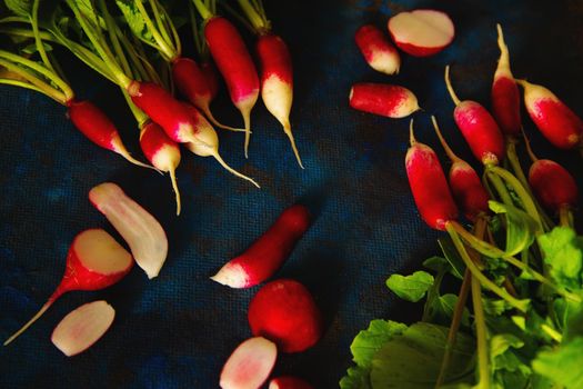radish on a blue background laid out in groups