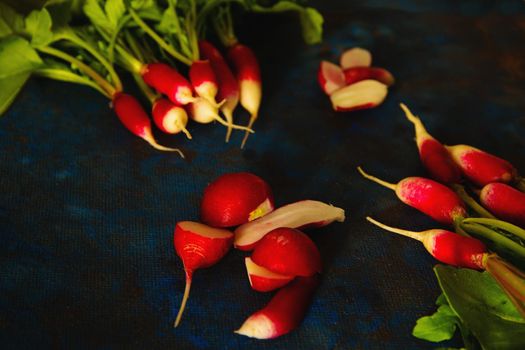 radish on a blue background laid out in groups