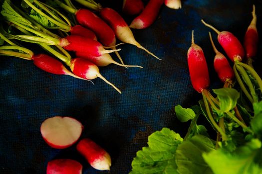 radish on a blue background laid out in groups