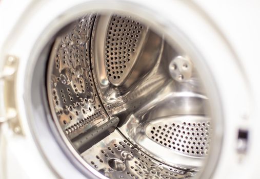 Drum of washing machine dry and clean close-up.Washing Dryer Machine inside view of a drum.