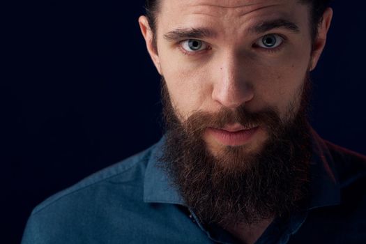 Cheerful man beard emotions black shirt close-up. High quality photo