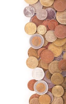 Coins of different countries on a white background