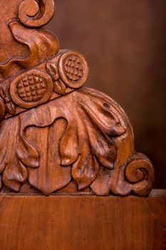 Old wooden table on black background with thread