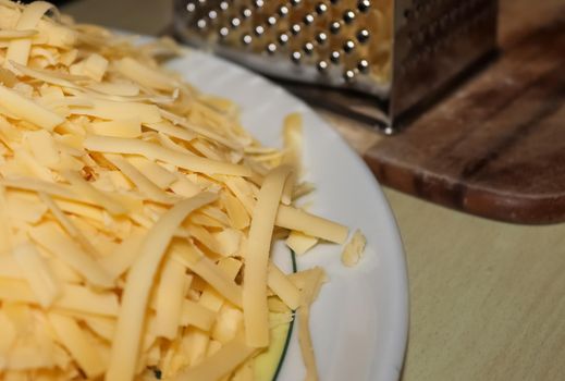 Close up of fresh chopped cheese as topping for a pizza