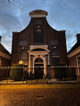 Church in the city IJlst during sunset in Friesland The Netherlands