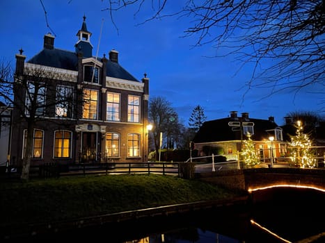 Bridge over a canal at night in IJlst Friesland The Netherlands