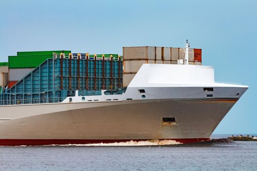 Grey container ship. Logistics and production import