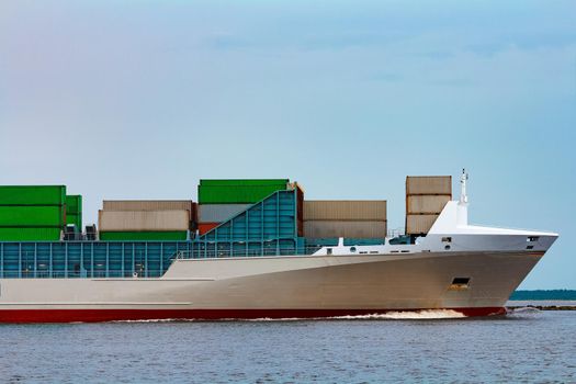 Grey container ship. Logistics and production import