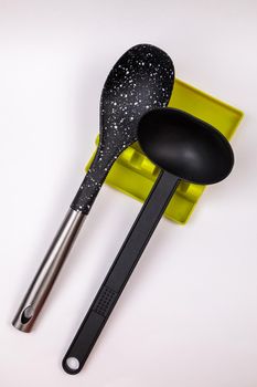 Stand, tray for large spoons, ladles, stirrers. Modern fittings in the kitchen. Convenient to prepare food.