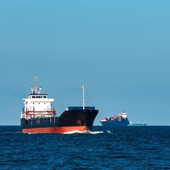 Black bulker ship. Logistics and merchandise transportations