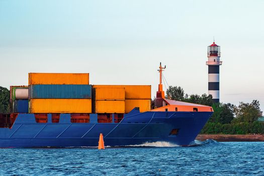 Blue container ship. Global logistics and merchandise transfer