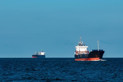 Black bulker ship. Logistics and merchandise transportations
