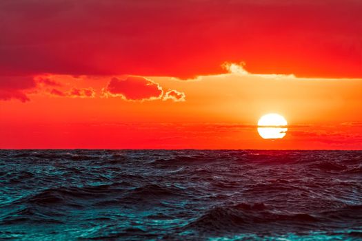 Hot and romantic sunset over the Baltic sea. Calm landscape