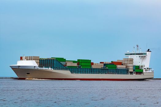 Grey container ship. Logistics and production import