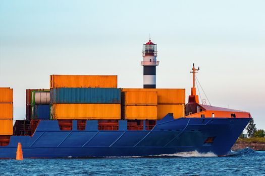 Blue container ship. Global logistics and merchandise transfer