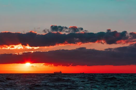 Hot and romantic sunset over the Baltic sea. Calm landscape