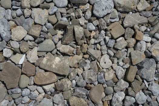Natural background of stones of different sizes of gray. For design and network