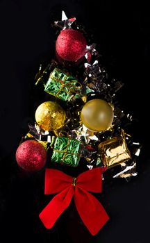 Christmas or New Year composition with retro decorations - stars, confetti, balls and gift boxes