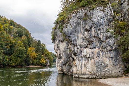 Nature reserve at Danube river breakthrough near Kelheim, Bavaria, Germany in autumn with limestone rock formations and plants with colorful leaves, autumnal impressions