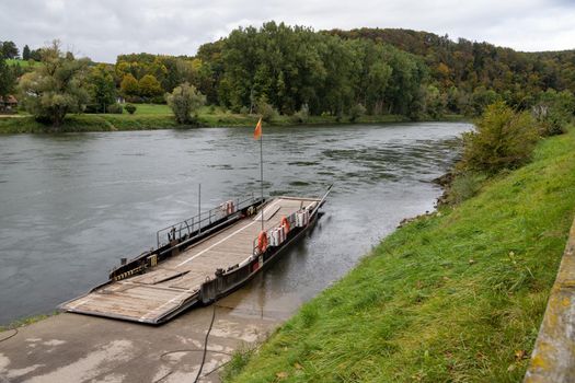 Ferry at Danube river breakthrough near monastery Weltenburg in Bavaria, Germany in autumn 