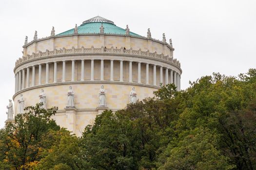 Close up of the Befreiungshalle in Kelheim, Bavaria, Germany at Danube river surrounded with autumnal trees