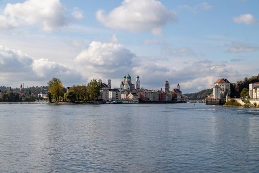 View at Danube, Inn and Ilz rivers and the silhouette of  Passau during a ship excursion i