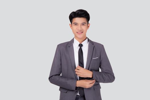 Portrait young asian businessman in suit smiling with confident and friendly isolated on white background, business man smart with success, manager or executive with handsome and leadership.