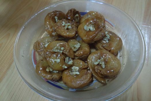 Delicious and tasty Asian sweet dish called balu shahi or baloshahi or balushahi. This dish is street sweet found in Pakistan India and Bangladesh and served in the festivities.