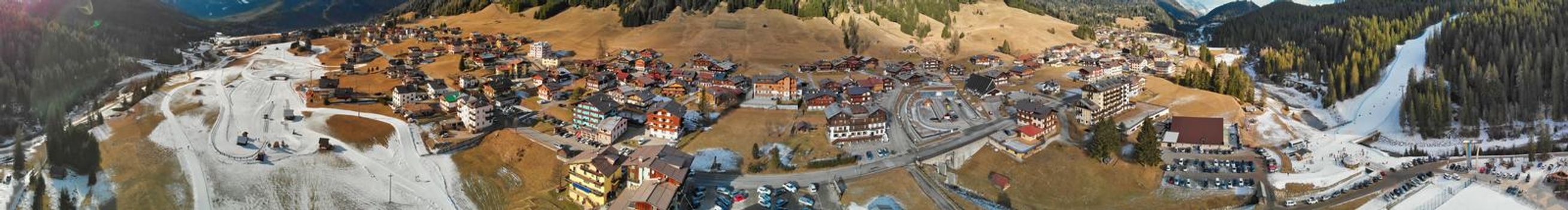 Sappada ski trail aerial view in winter season, Italian Alps.