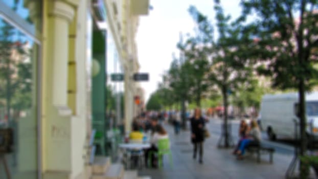 Urban streetscape. Theme of street photography, tourism and travel creative abstract background with blur and bokeh effect