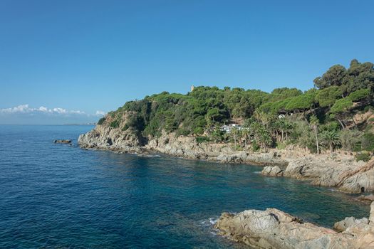 Seascape. Rocky seashore, Sunny day, good weather. Stock photo.