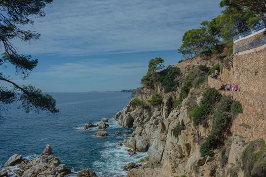 Seascape. Rocky seashore, Sunny day, good weather. Stock photo.