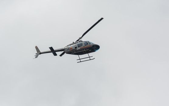 Tenerife, Spain - 05/17/2018: Helicopter in flight. Stock photo