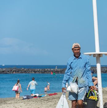 Spain, Tenerife - 09/19/2016: Fruit seller on the beach. Stock photography