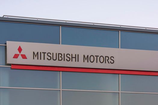 Belarus, Minsk-11/09/2020: MITSUBISHI MOTORS Logo on the building facade. Stock photo.