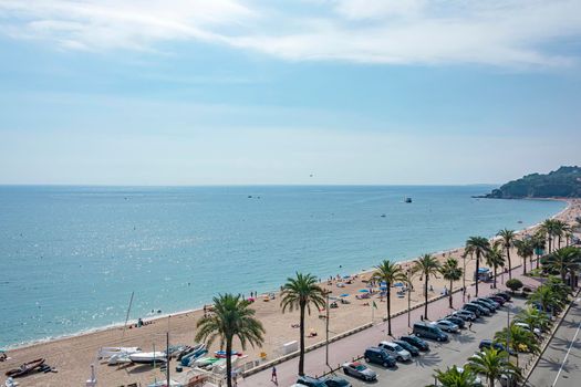 Seascape. Coastline with the beach and promenade, the view from the top (Lloret de Mar, Spain). Stock photo