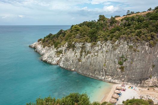 seascape. A small beach in a crevice between the coastal rocks. Color stock photo (Xigia Beach, Greece, Zakynthos Island)