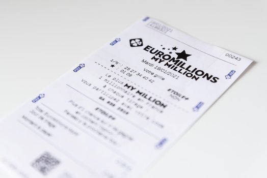 BAYONNE, FRANCE - CIRCA JANUARY 2021: Francaise des Jeux Euromillions receipt on white background. EuroMillions is a European transnational lottery, it was launched in 2004.