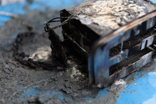 Toaster after fire. Household electrical appliance fire hazard. Overload. Short circuit. Carelessness. Safety in home. Danger home inflammation Insurance concept