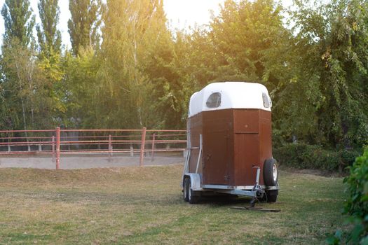 Horse trailer standing outdoor . vehicle for horse transportation Travel with animals